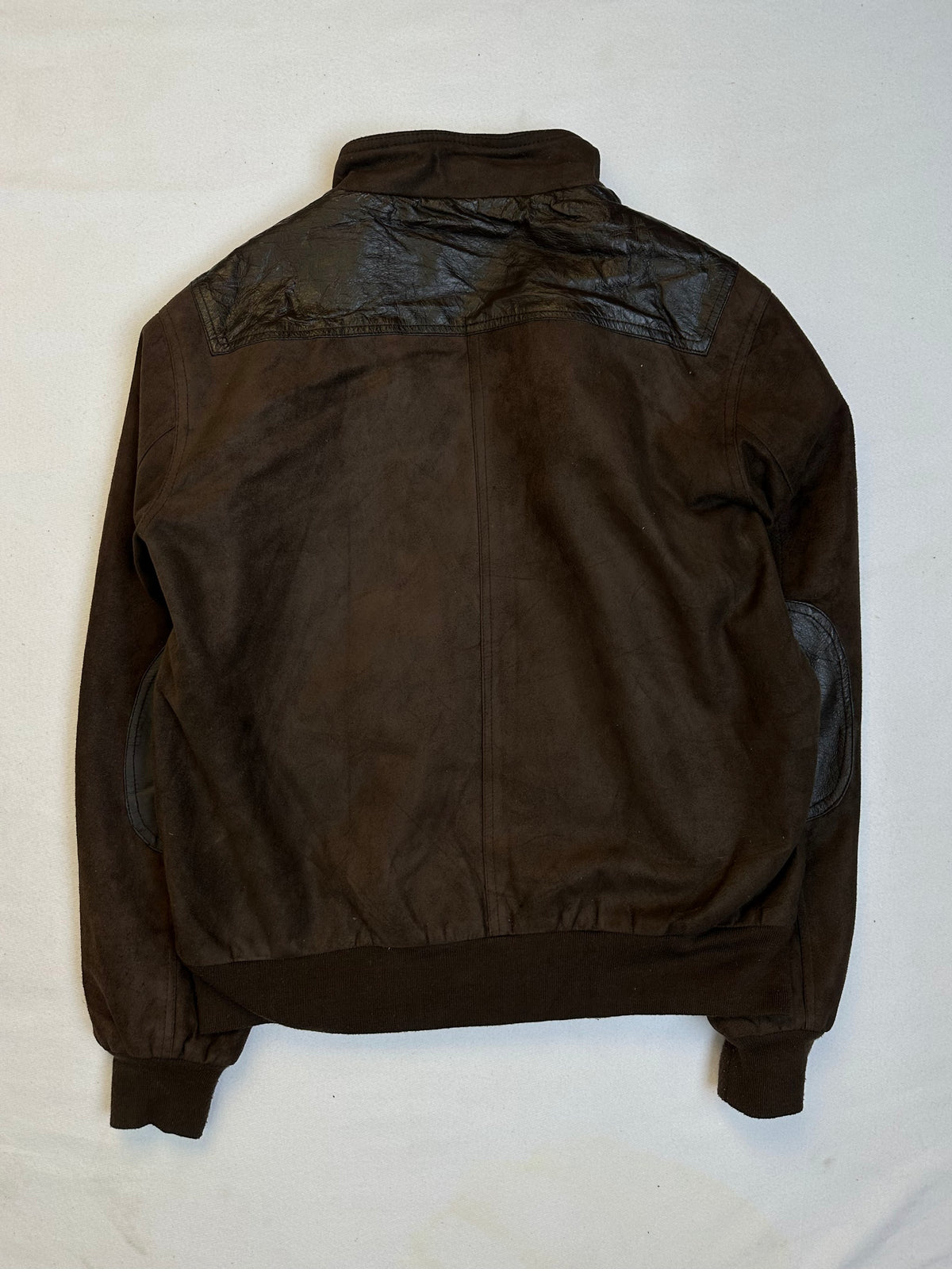 Back of the size L brown leather cafe racer jacket, laid flat