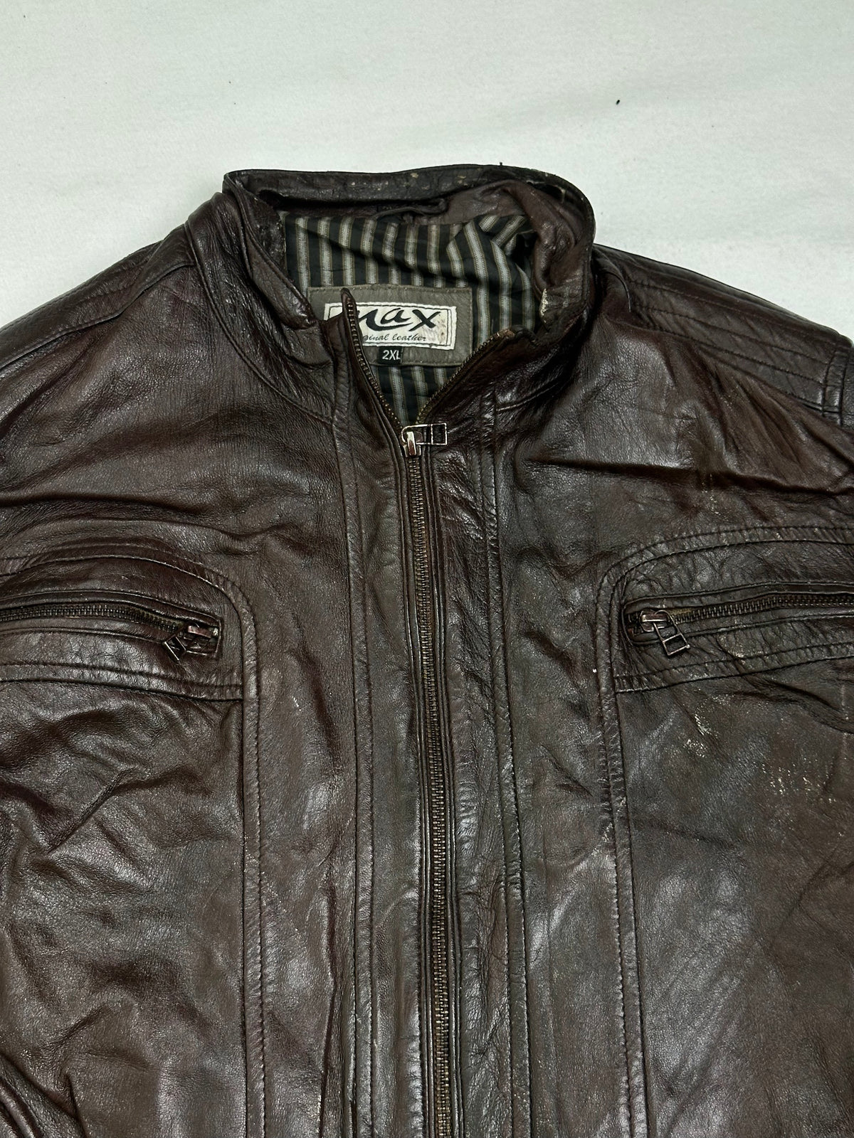 Grey and black striped lining shown with the jacket open
