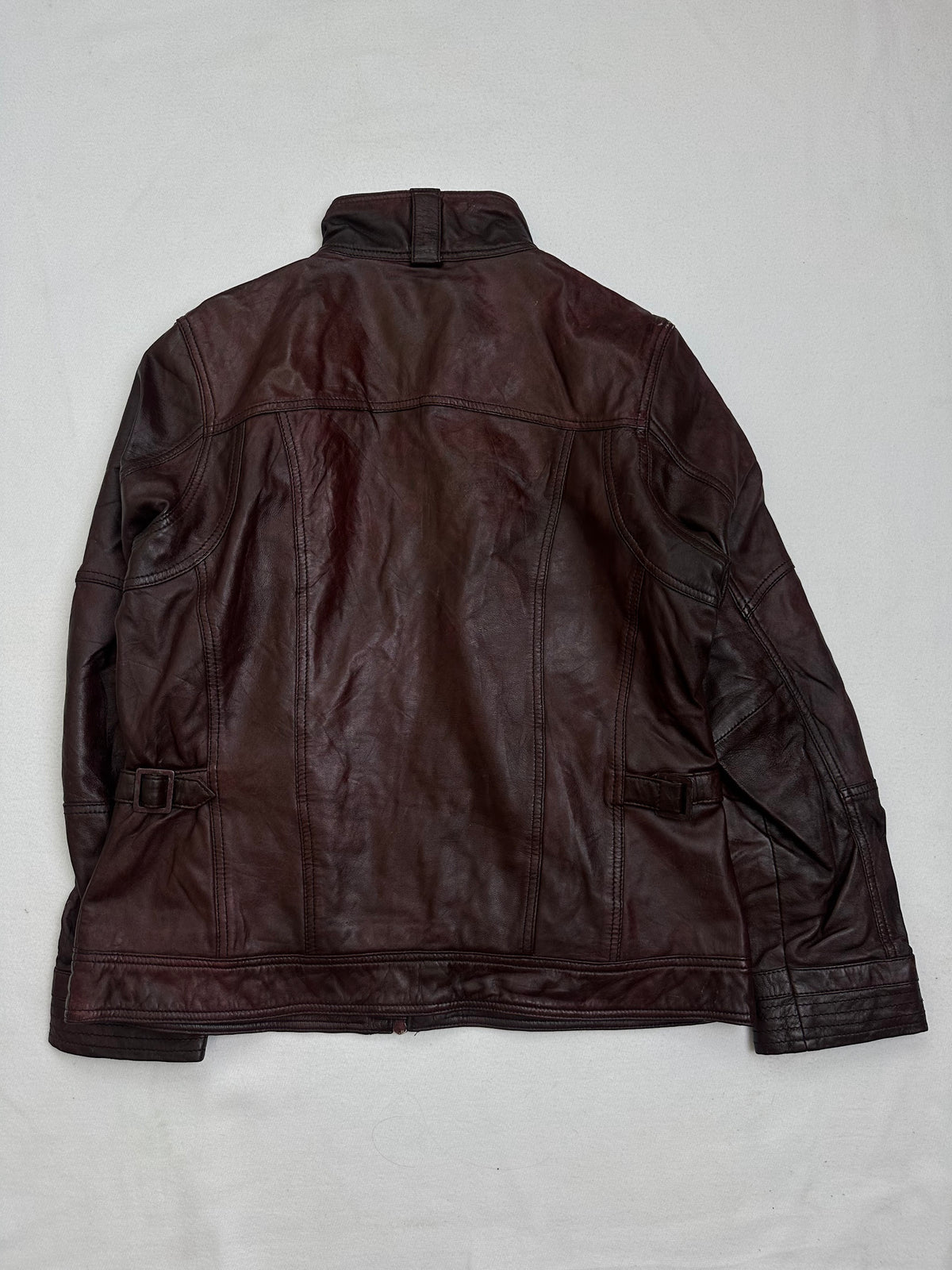 Back of the size M burgundy leather cafe racer jacket, laid flat