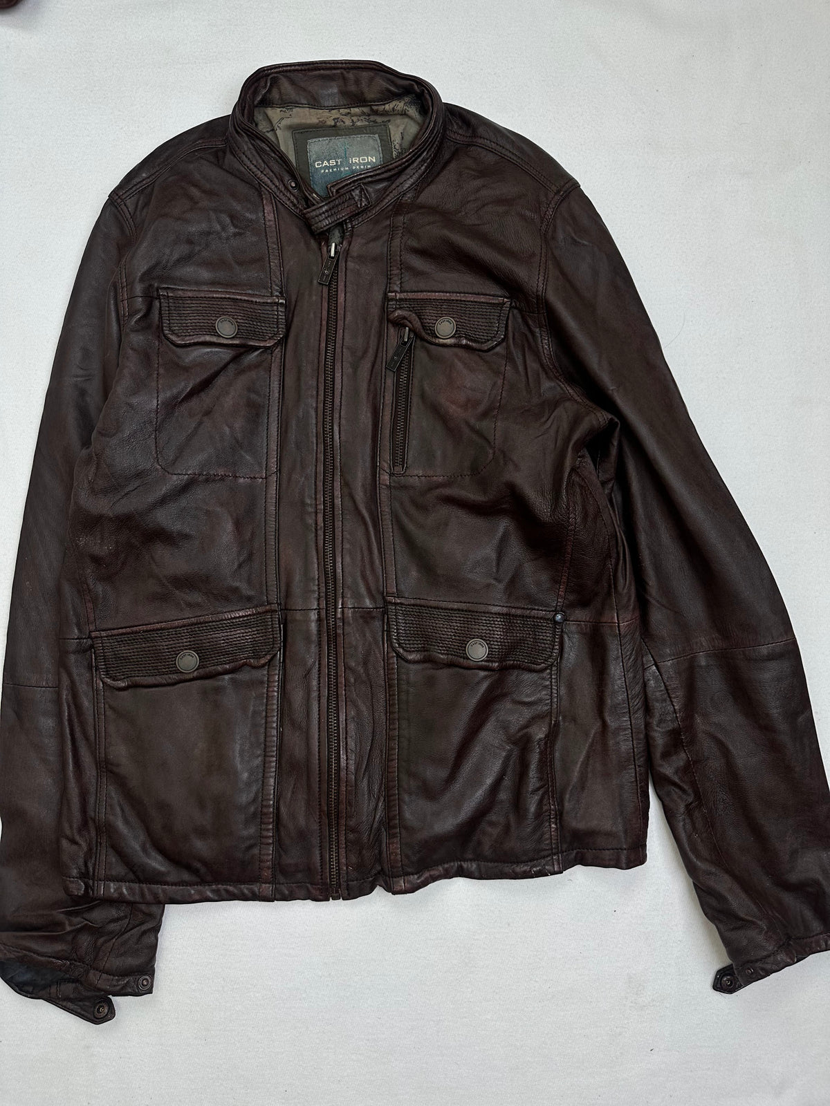Front of the size L burgundy leather field jacket, laid flat and unedited