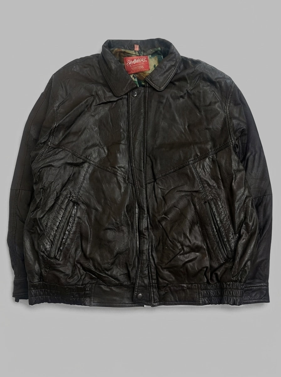 Brown leather harrington jacket, size L, shown flat from the front. Cream printed lining.