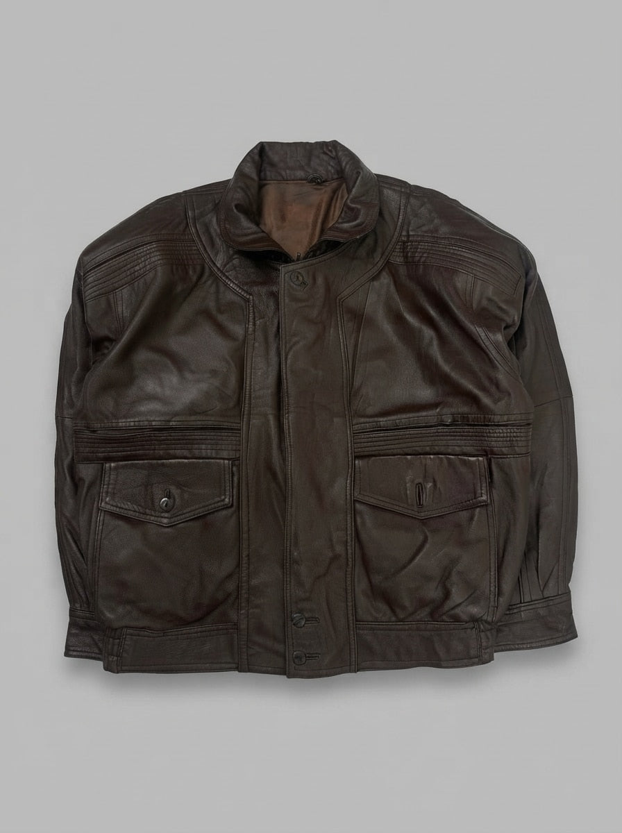 Brown leather flight jacket, size L, shown flat from the front. Quilted Shoulder Panels.