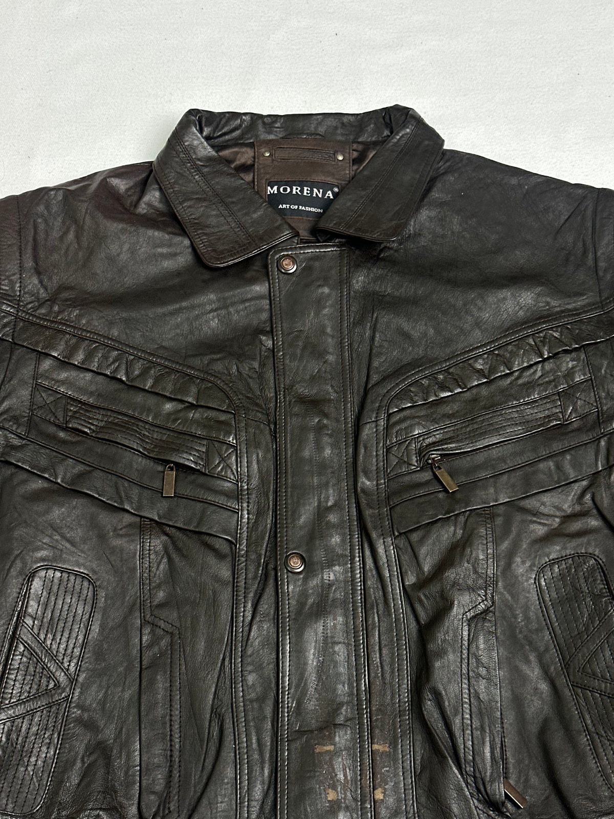 Dark brown satin lining shown with the harrington held open
