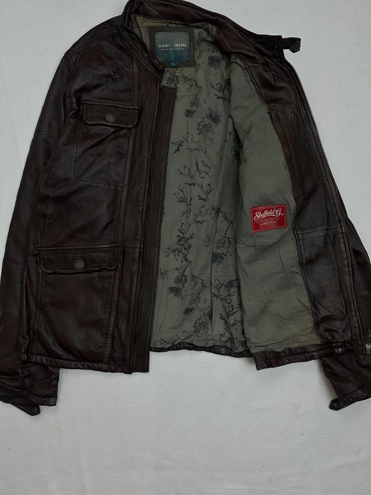 The size L burgundy leather field jacket opened to show the lining