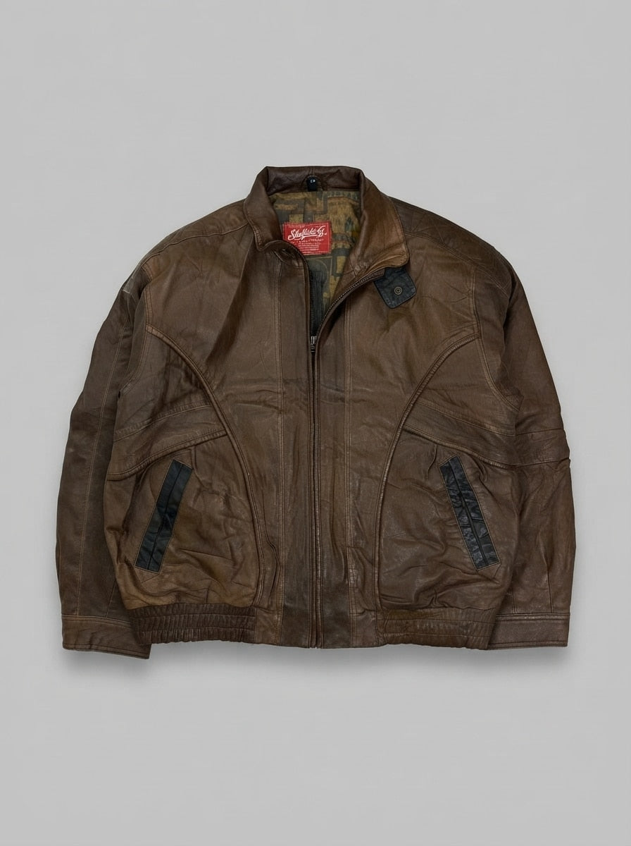 Brown leather harrington jacket, size L, shown flat from the front. Patterned olive lining.