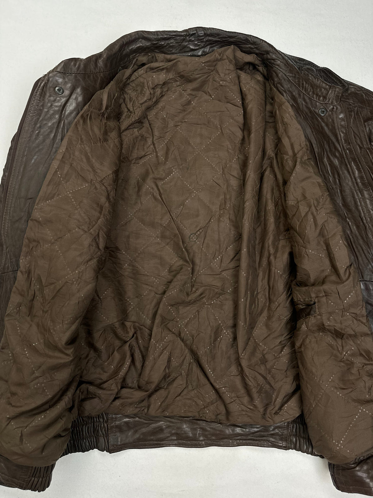 Olive quilted lining shown with the harrington held open