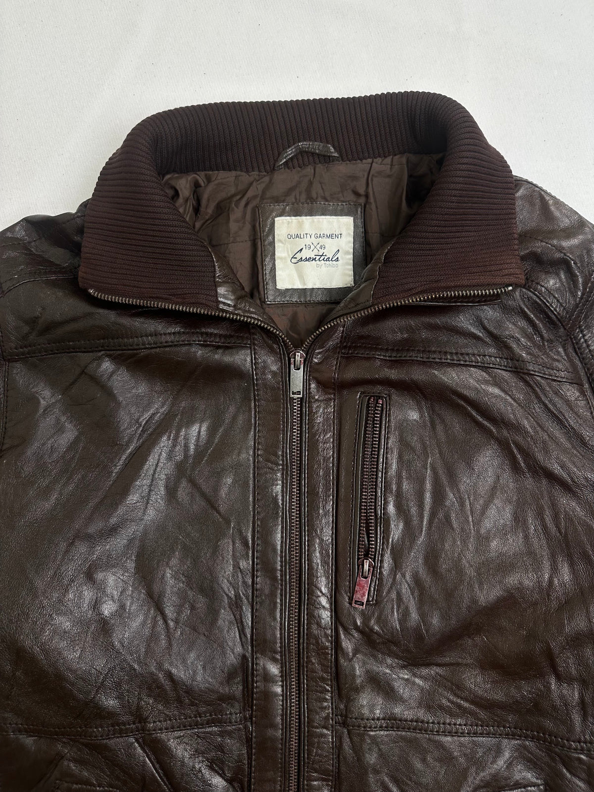 Brown quilted lining shown with the jacket held open