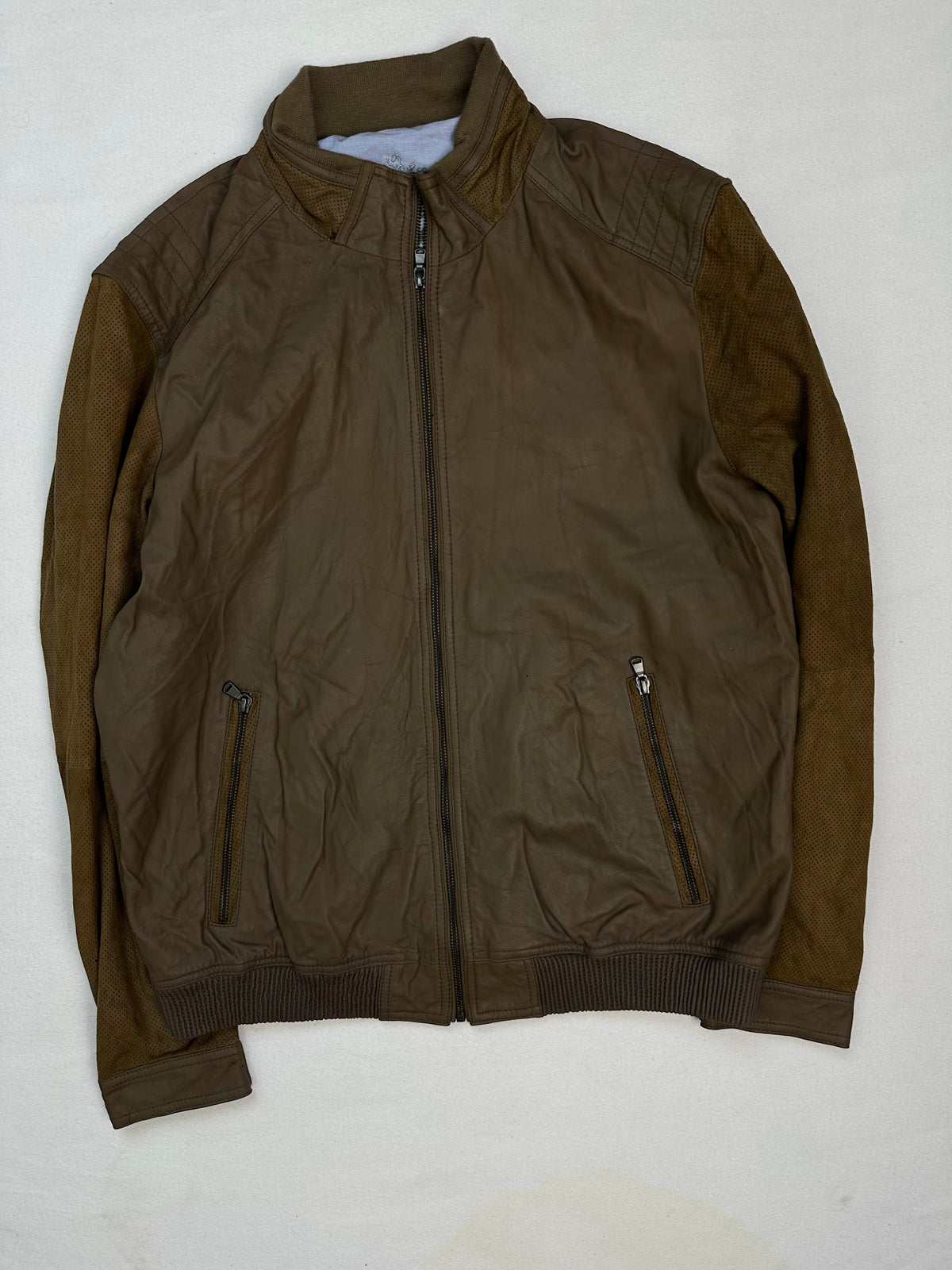 Front of the size L brown leather cafe racer jacket, laid flat and unedited
