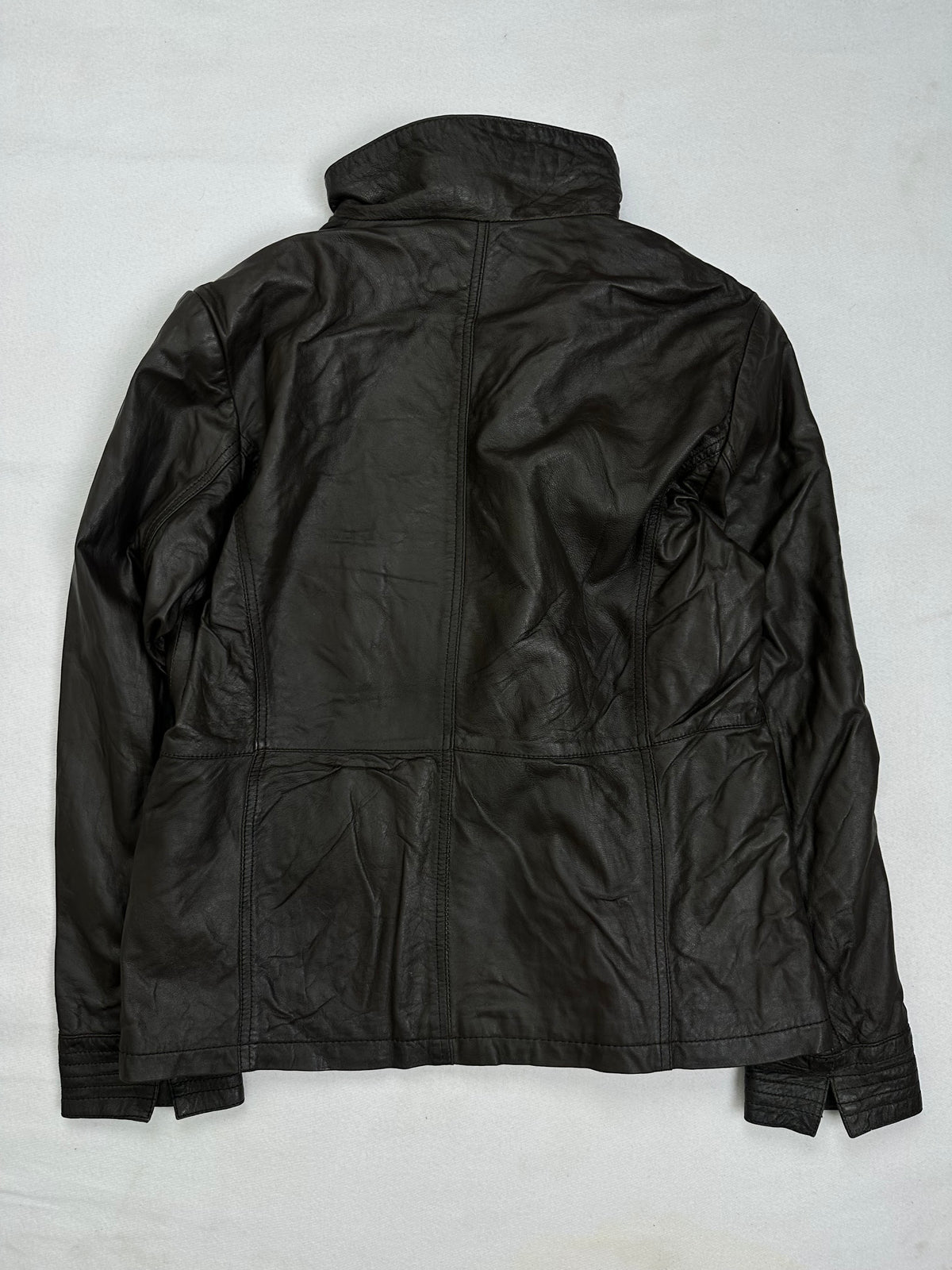 Back of the size S brown leather cafe racer jacket, laid flat