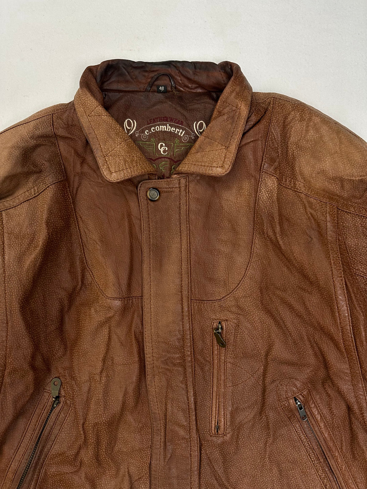 Brown woven lining shown with the harrington held open