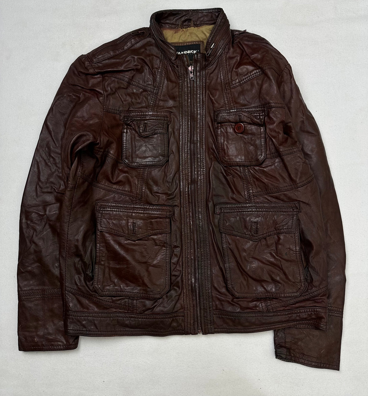 Front of the size L burgundy leather field jacket, laid flat and unedited