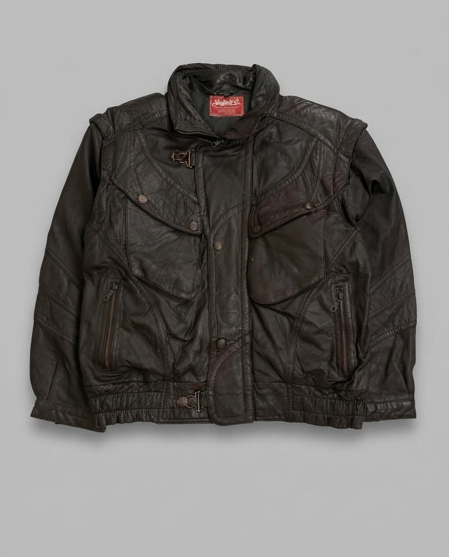 Brown leather vintage jacket, size XL, shown flat from the front. Olive quilted lining.