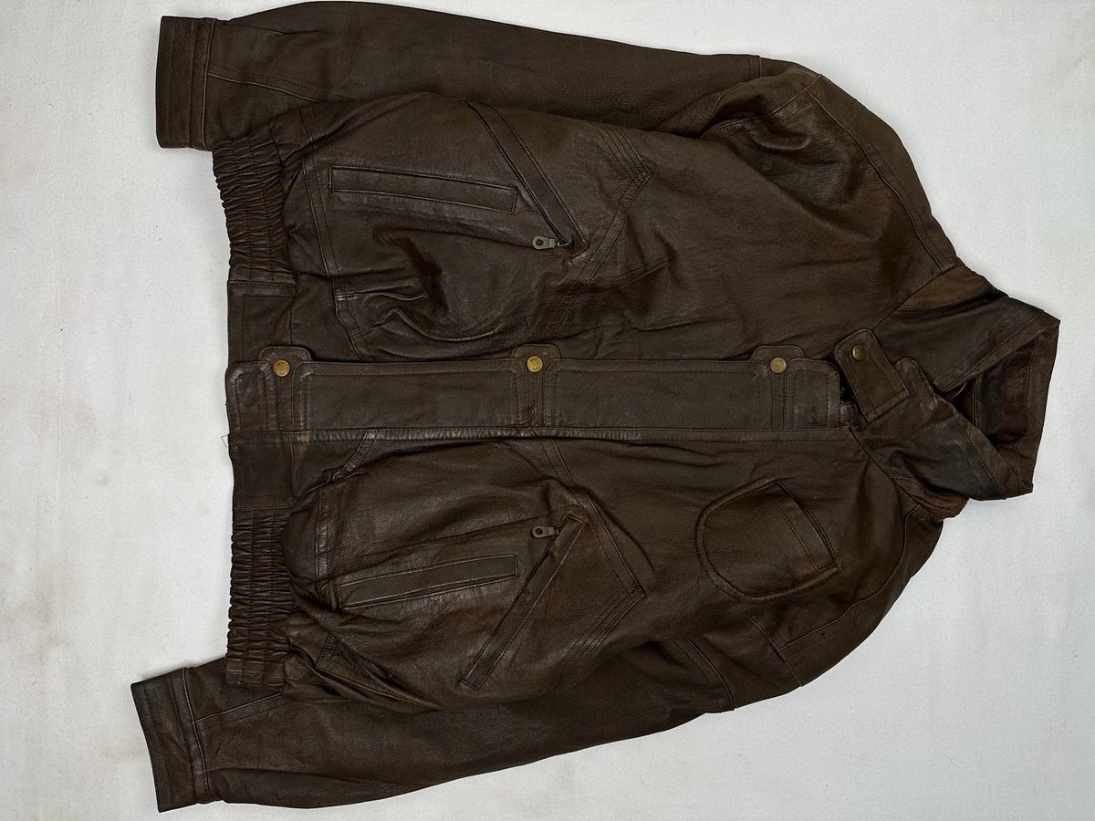 Back of the size M brown flight jacket laid flat