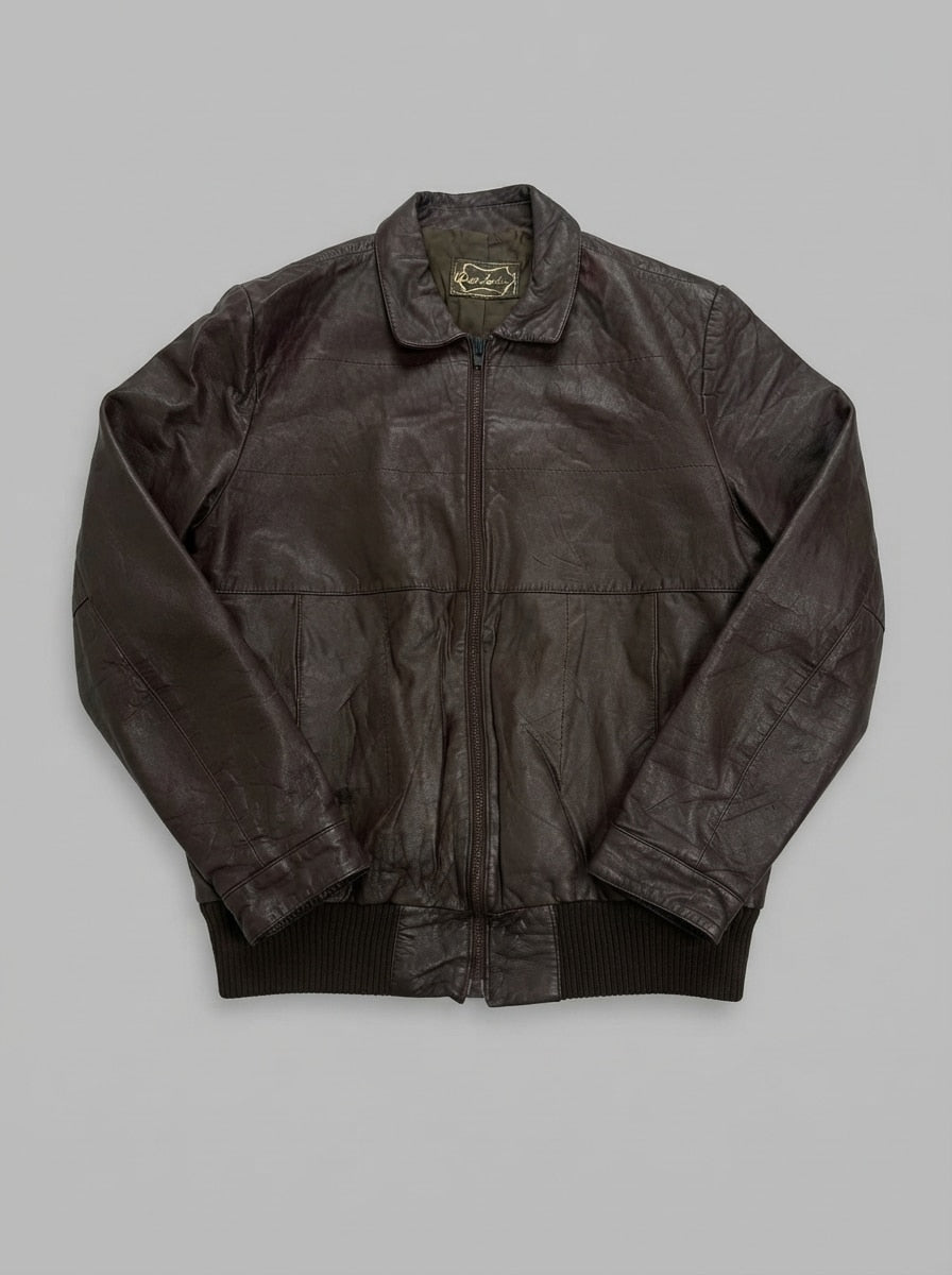 Brown leather flight jacket, size L, shown flat from the front. Welt hand pockets.