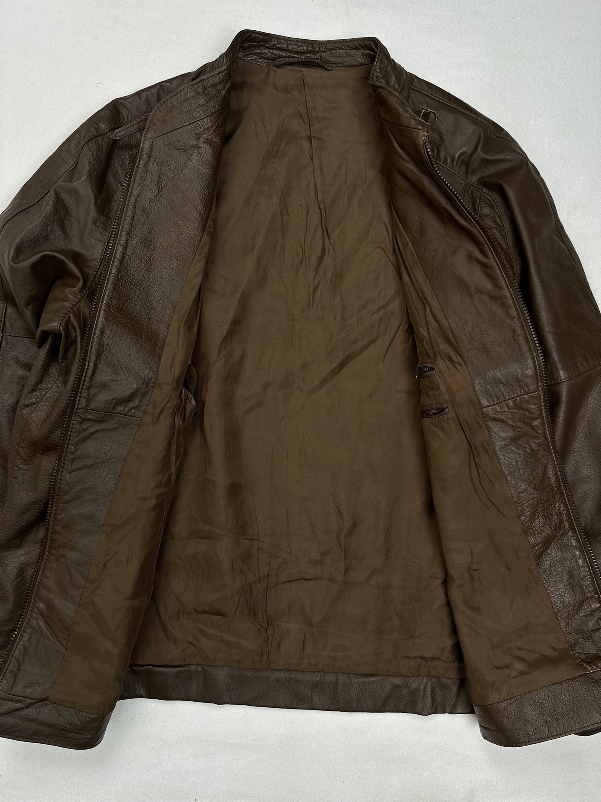 Olive brown lining shown with the cafe racer held open