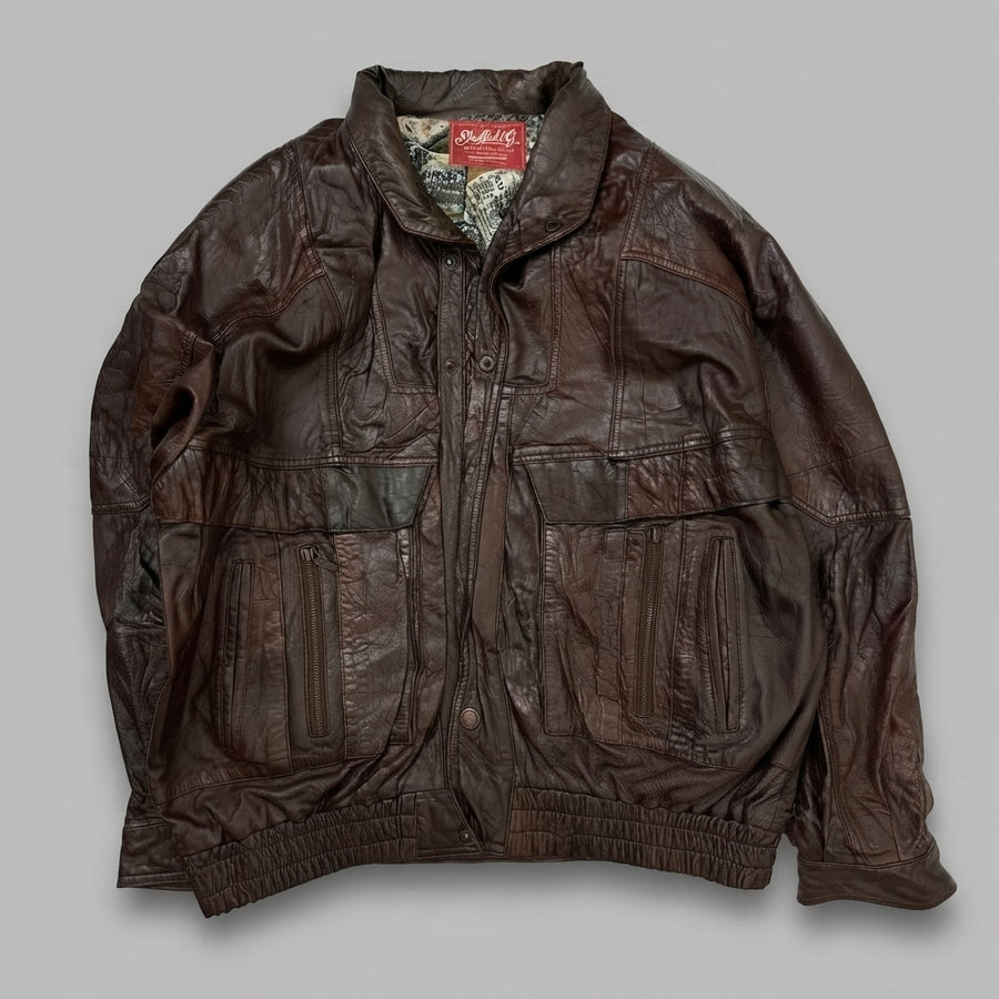 Burgundy leather flight jacket, size XL, shown flat from the front. Pleated Flap Pockets.