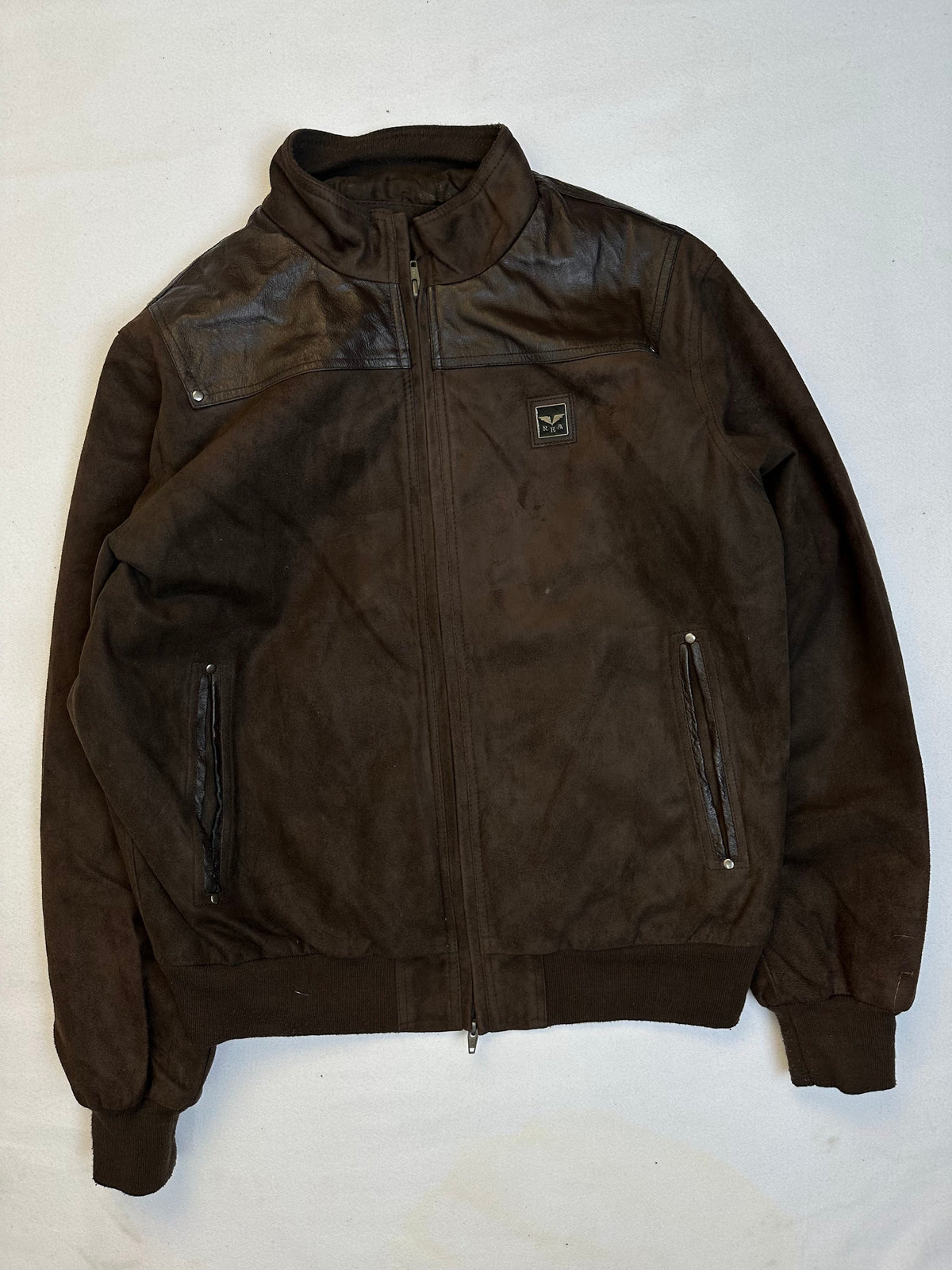 Front of the size L brown leather cafe racer jacket, laid flat and unedited
