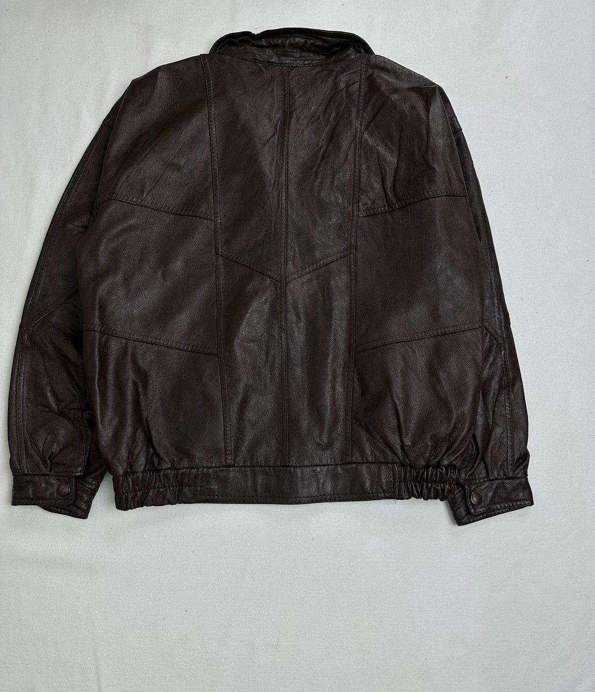 Dark brown lining shown with the flight jacket held open