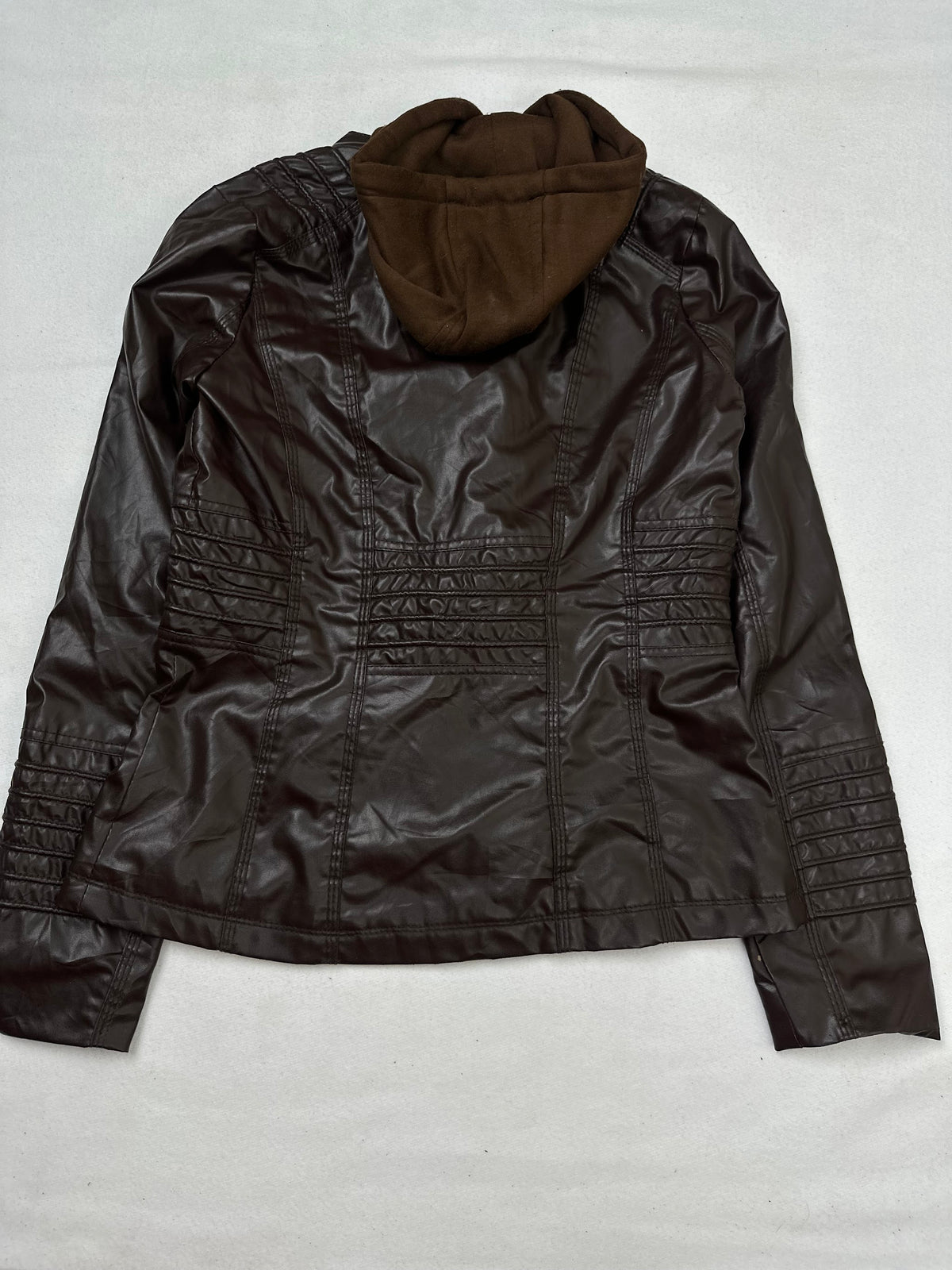 Back of the size M brown leather hooded jacket, laid flat