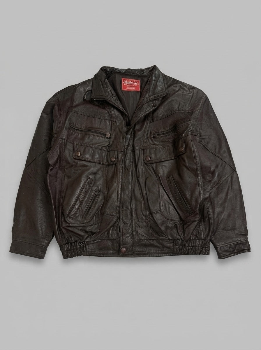 Brown leather flight jacket, size L, shown flat from the front. Slanted hand pockets.