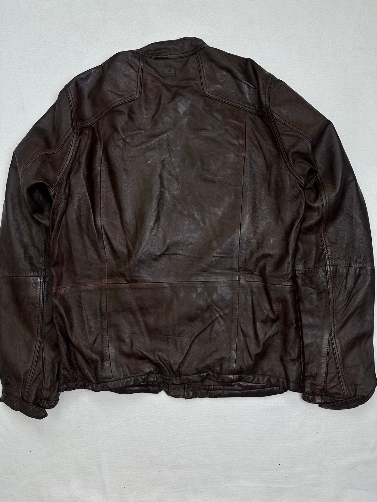 Back of the size L burgundy leather field jacket, laid flat