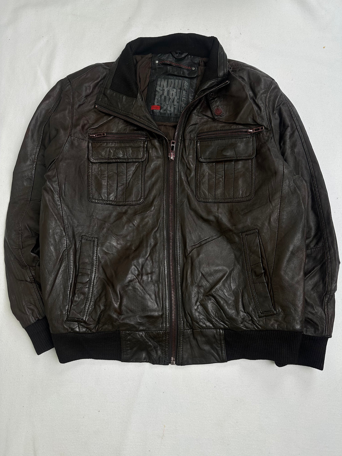Back of the size L brown bomber jacket laid flat