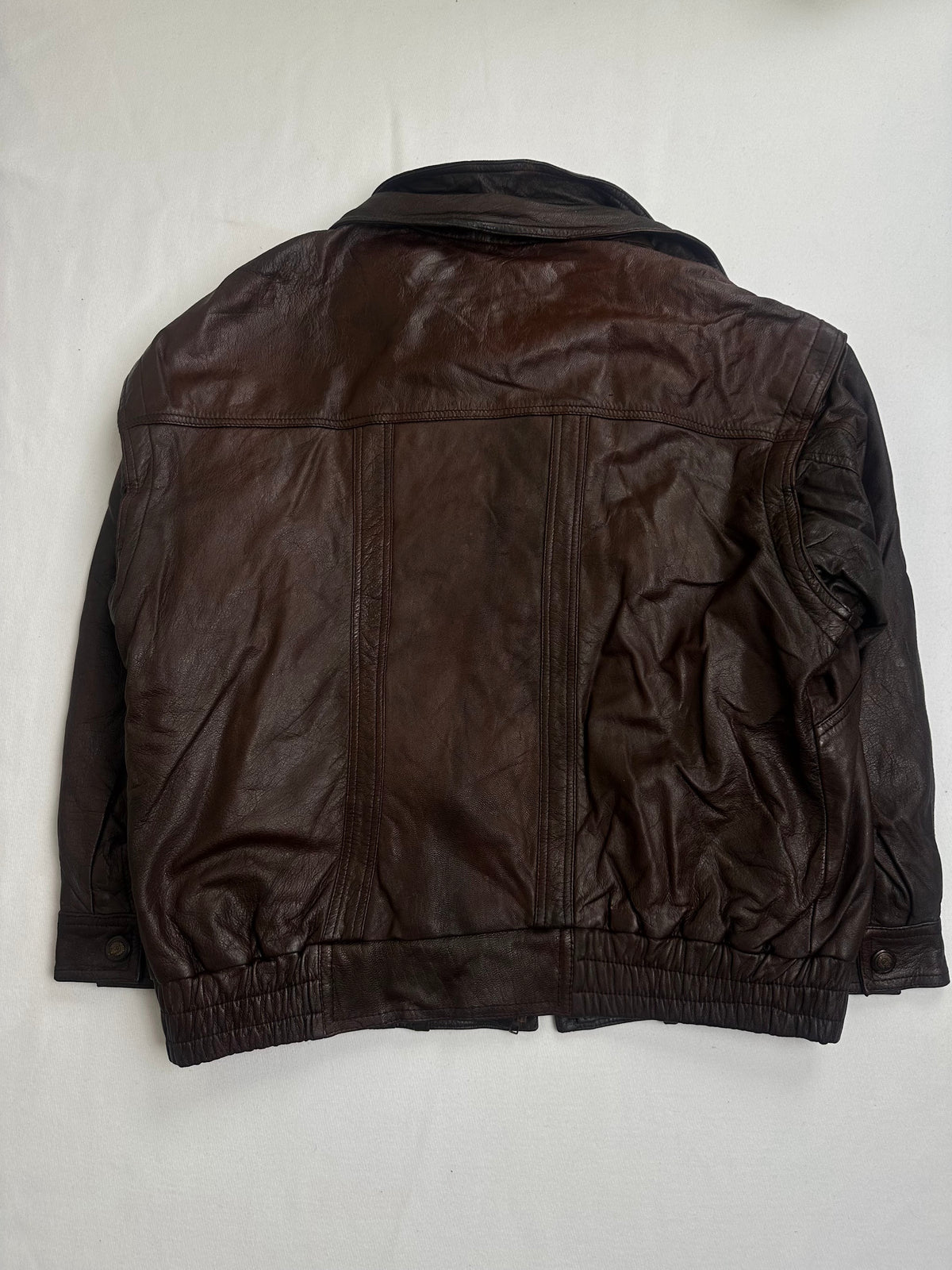 Reverse of the size XL brown harrington laid flat