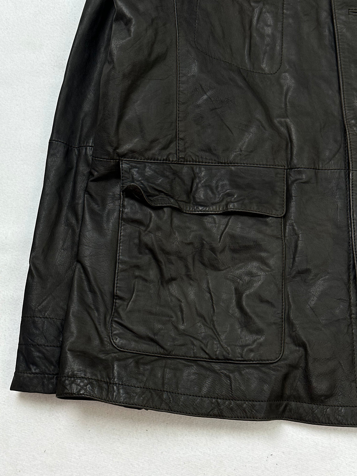 Close detail of the pockets and cuff on the size XL brown leather field jacket
