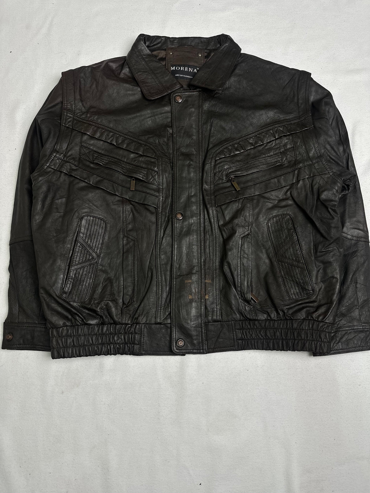 Back of the size XL brown harrington jacket laid flat