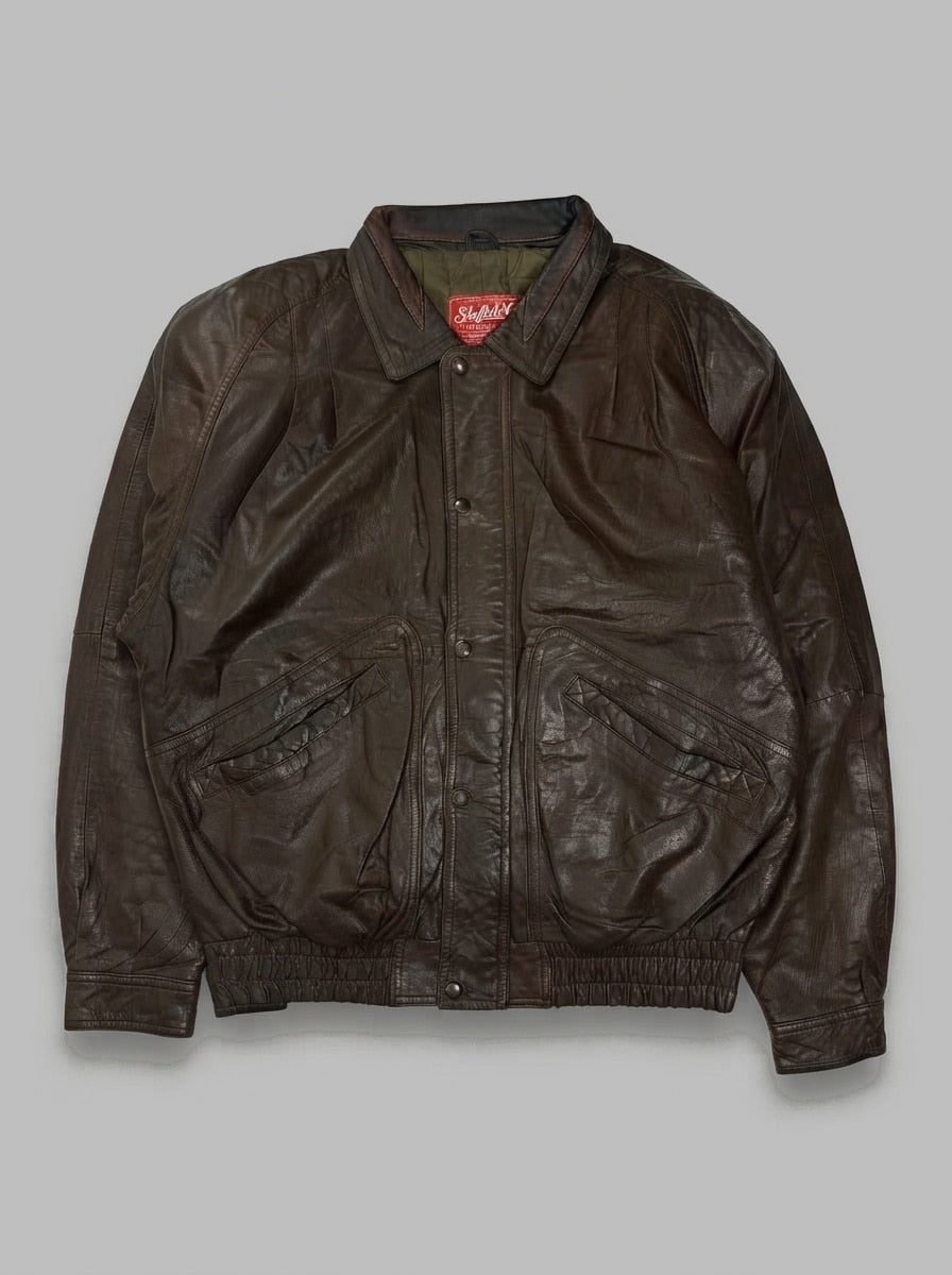 Brown leather harrington jacket, size M, shown flat from the front. Clasps over the zip.