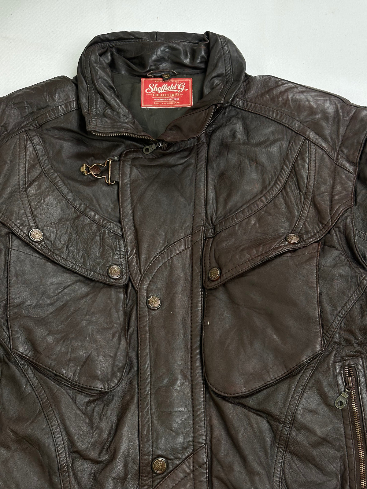 Olive quilted lining shown with the jacket held open
