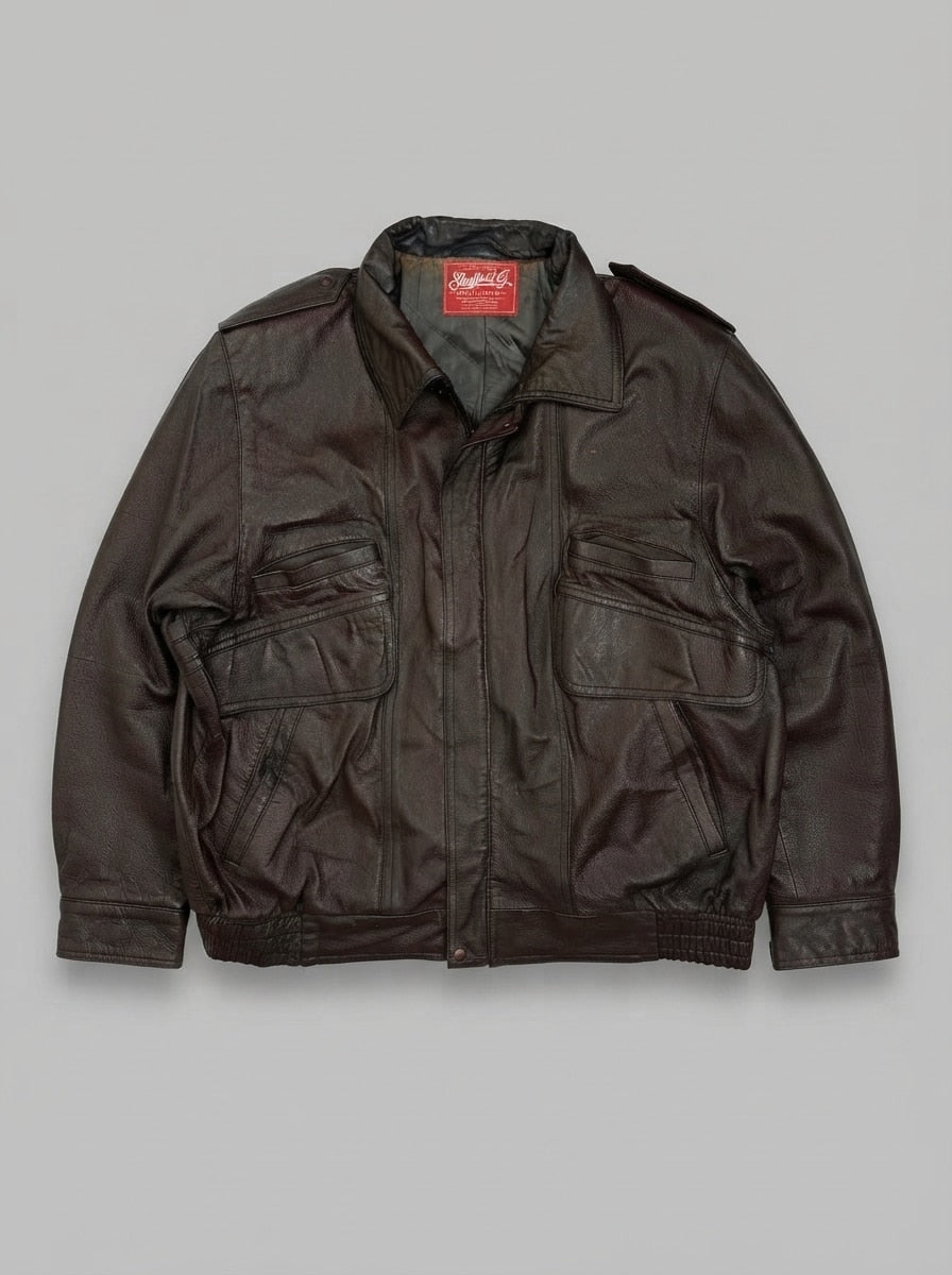 Brown leather flight jacket, size L, shown flat from the front. Shoulder Epaulettes.