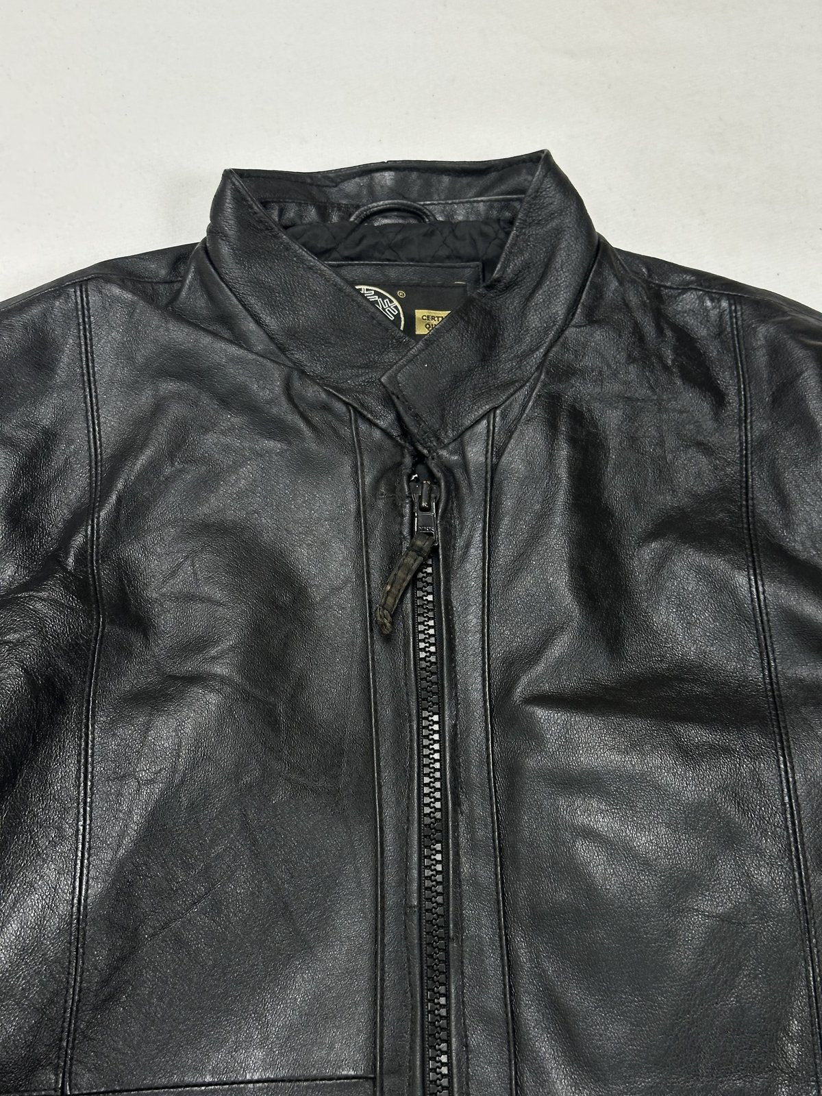 Black cafe racer jacket in very good condition, shown in size L