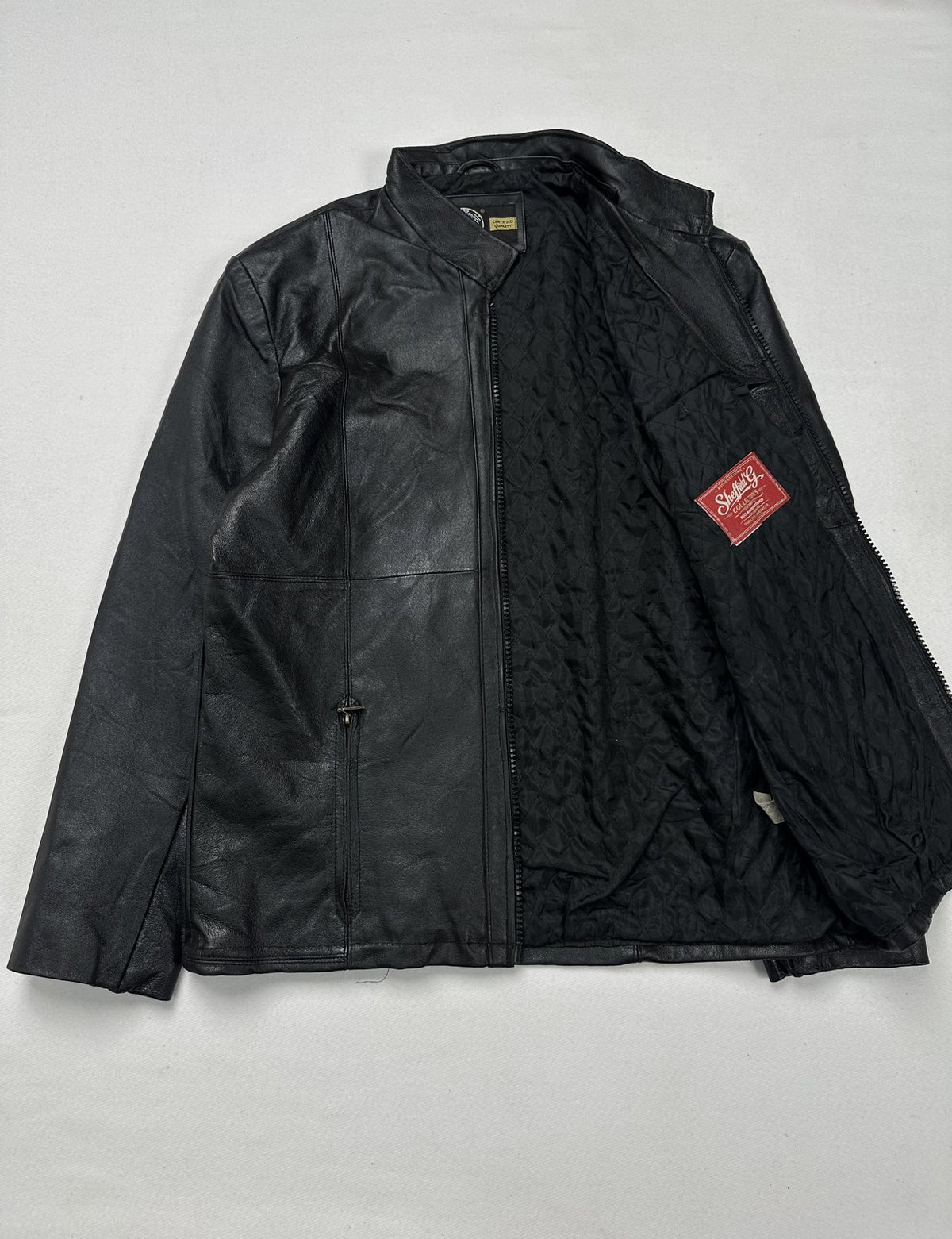 Slim black leather cafe racer with a 24 inch sleeve in size L