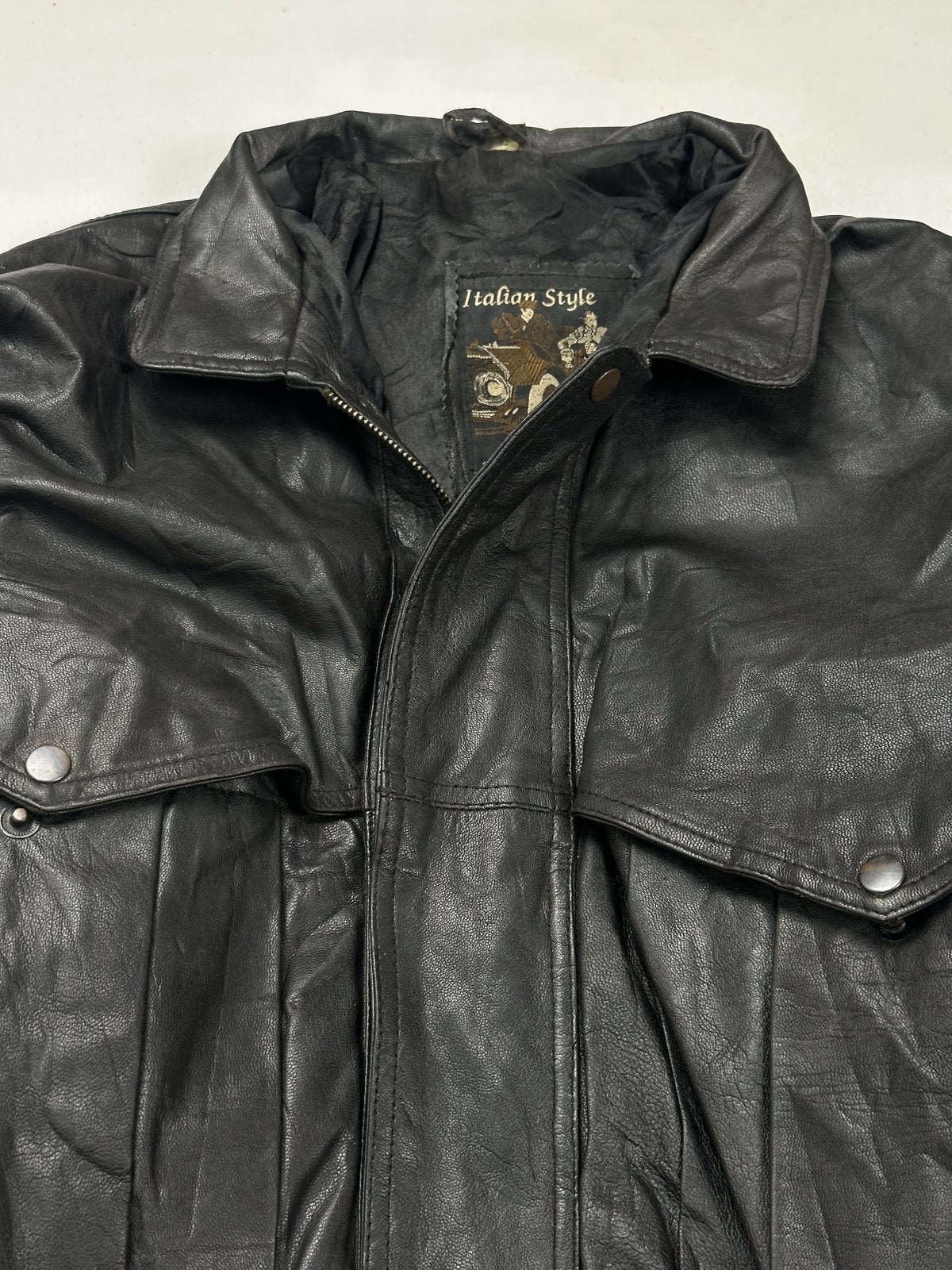 The size XXL jacket, 26 inches long through the body
