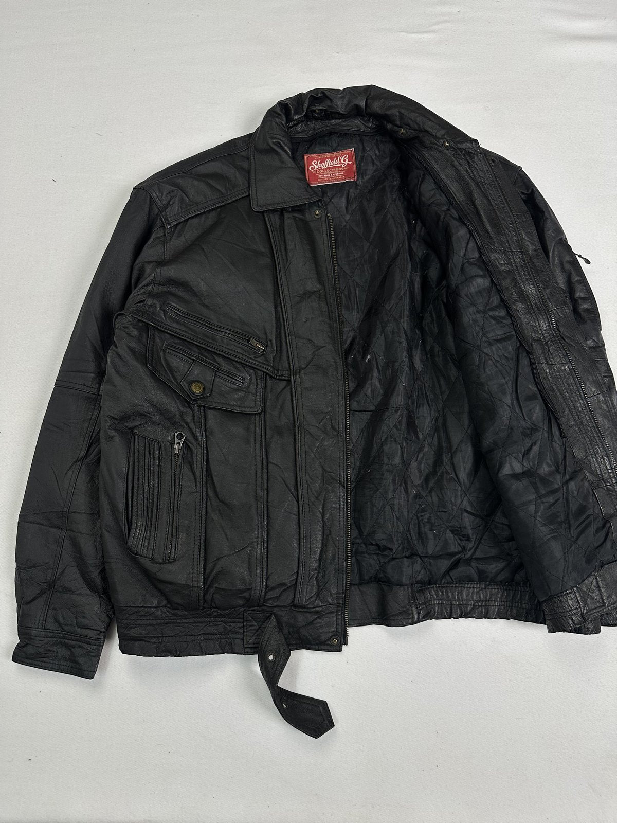 Pocket detail on the black leather field jacket in size XXL