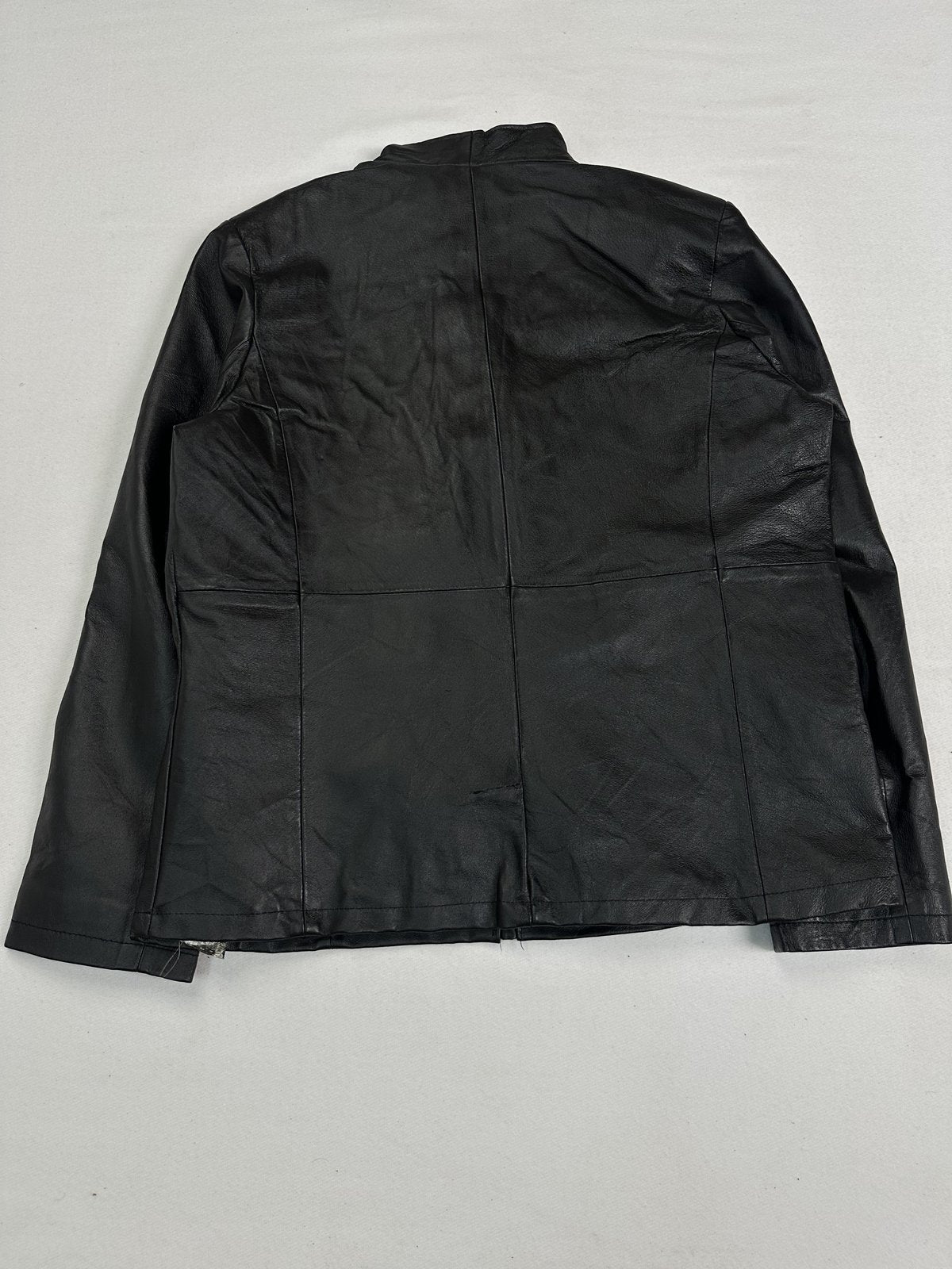 Black leather cafe racer jacket in size L with welt pockets