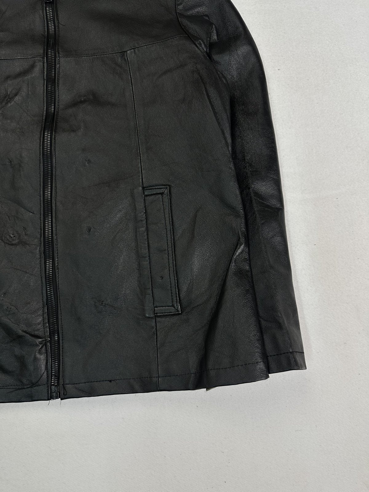 Black cafe racer jacket in very good condition, shown in size L