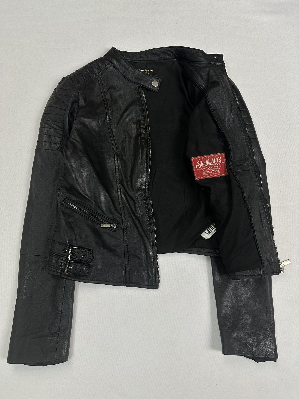 Size S black leather cafe racer with a 24 inch sleeve