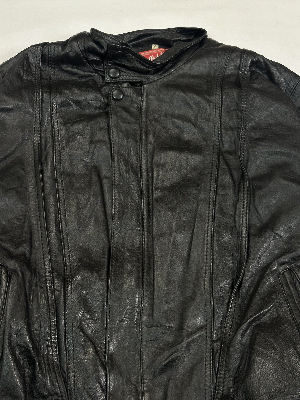The size XL blouson, 27 inches long through the body