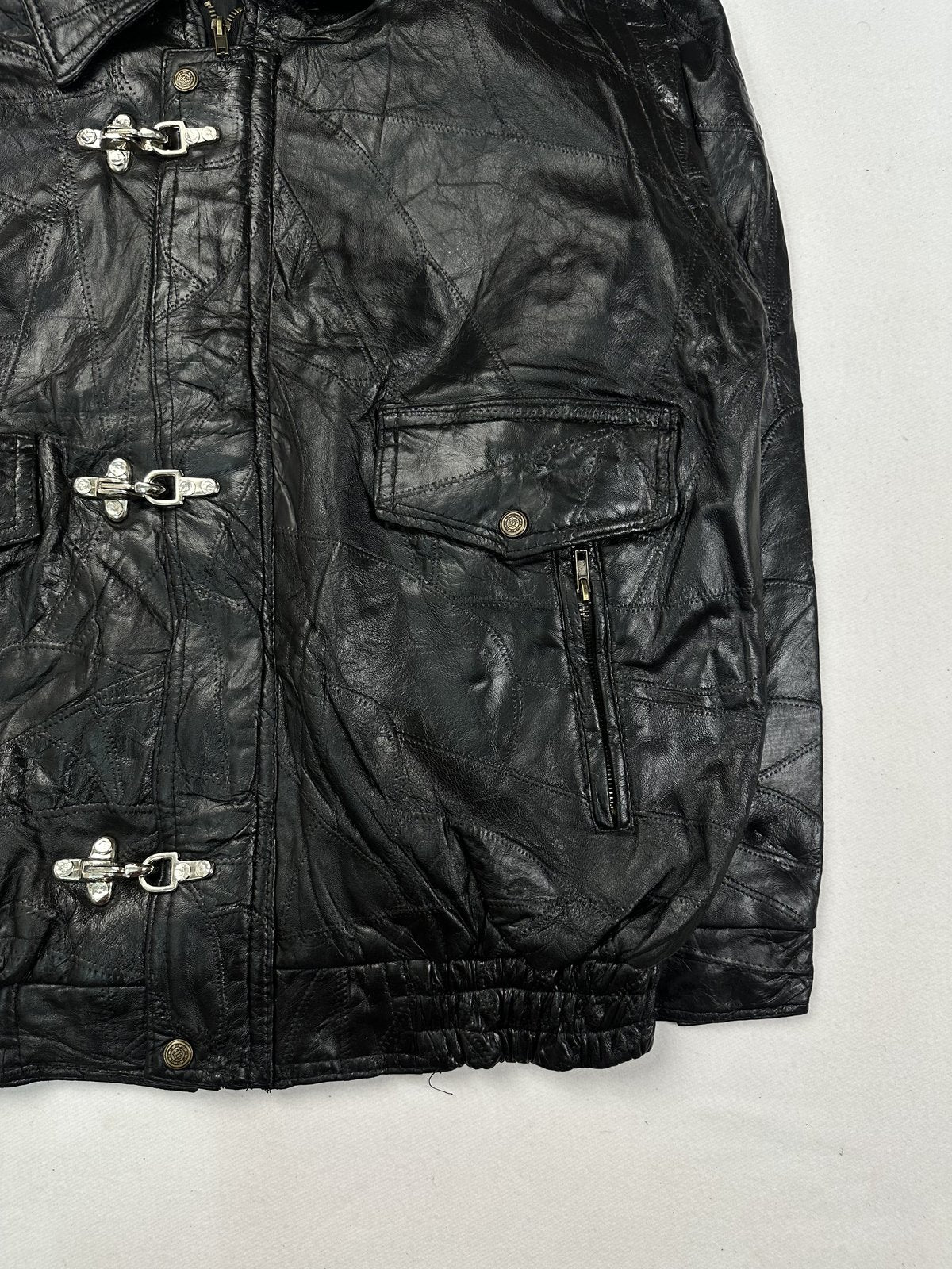 Patchwork leather panels joined across the body of the XXL jacket