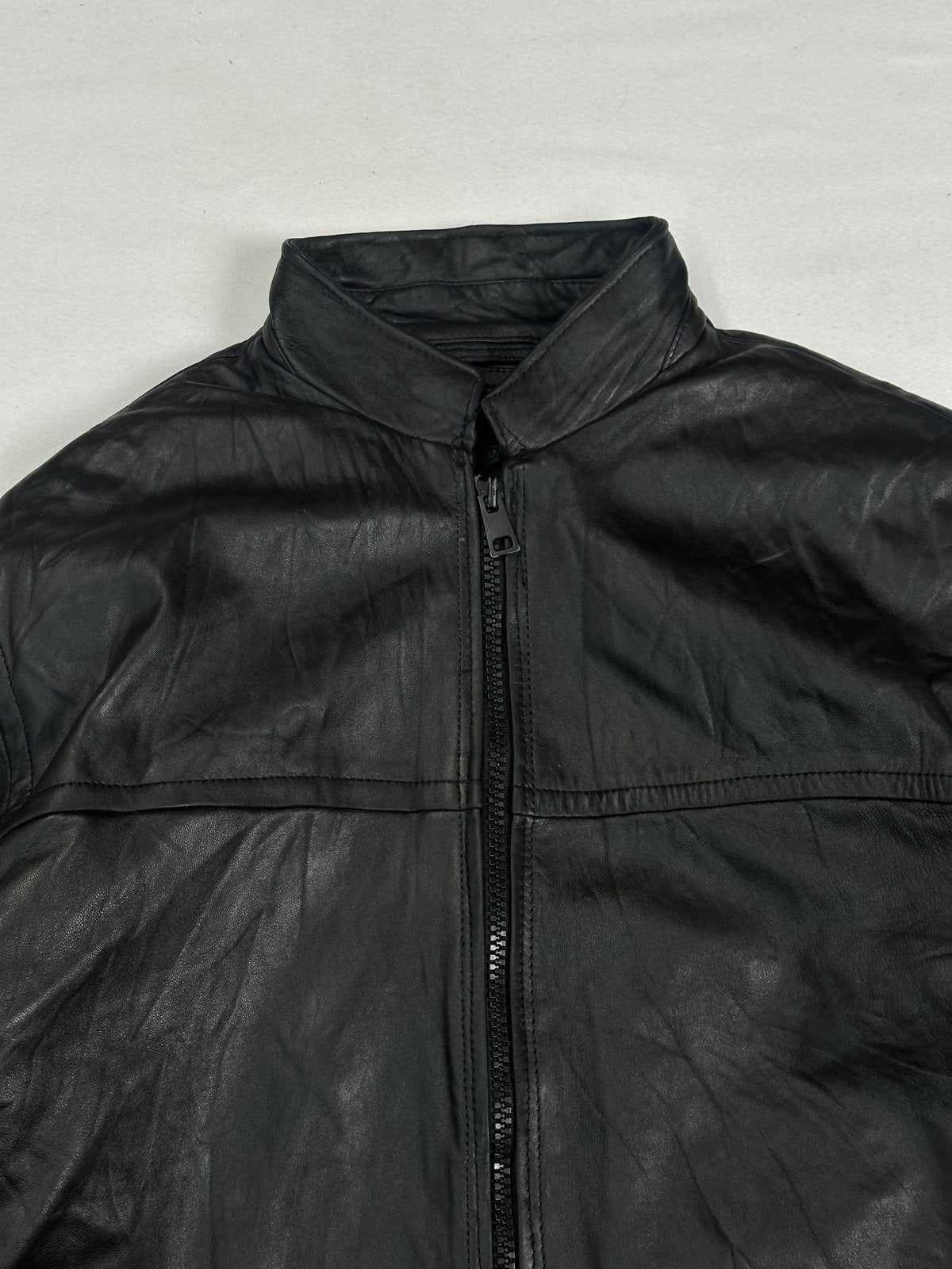 The size L black cafe racer, 27 inches long through the body
