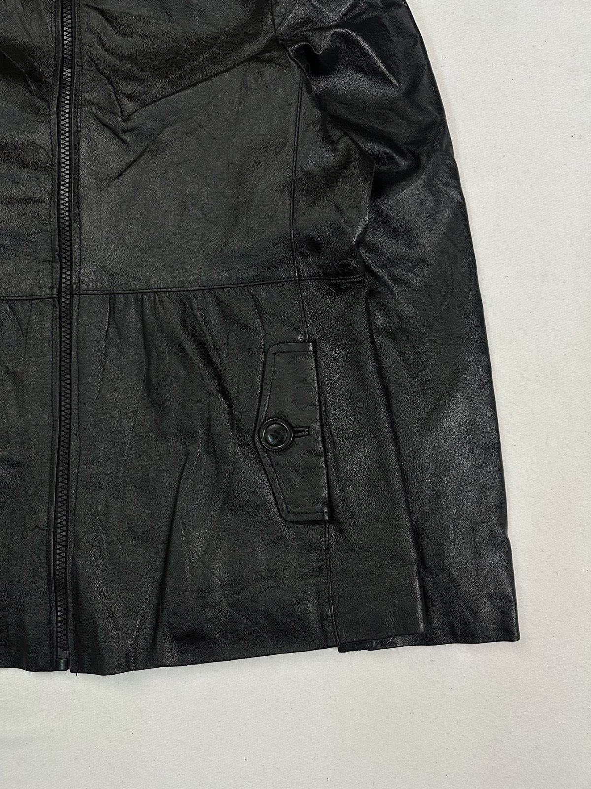 Size M jacket in black real leather with a 21 inch chest