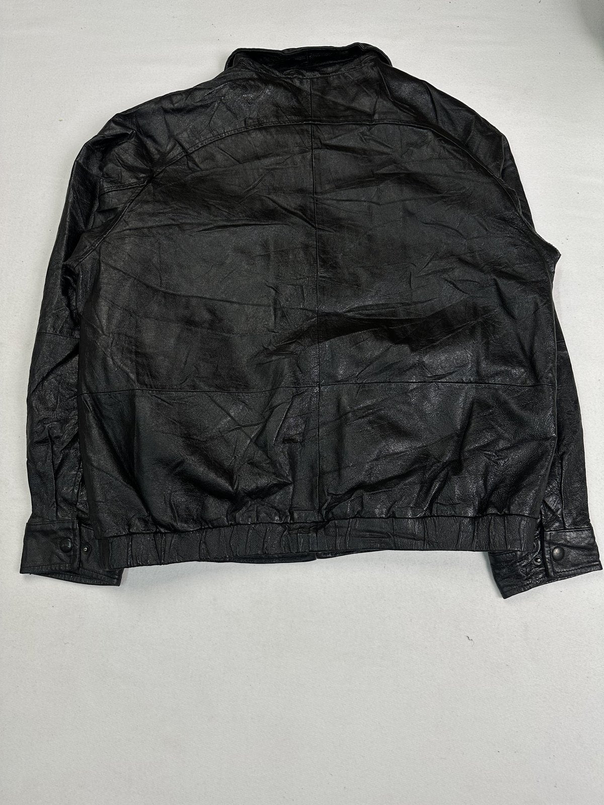 Broad shouldered black leather harrington jacket in size XL