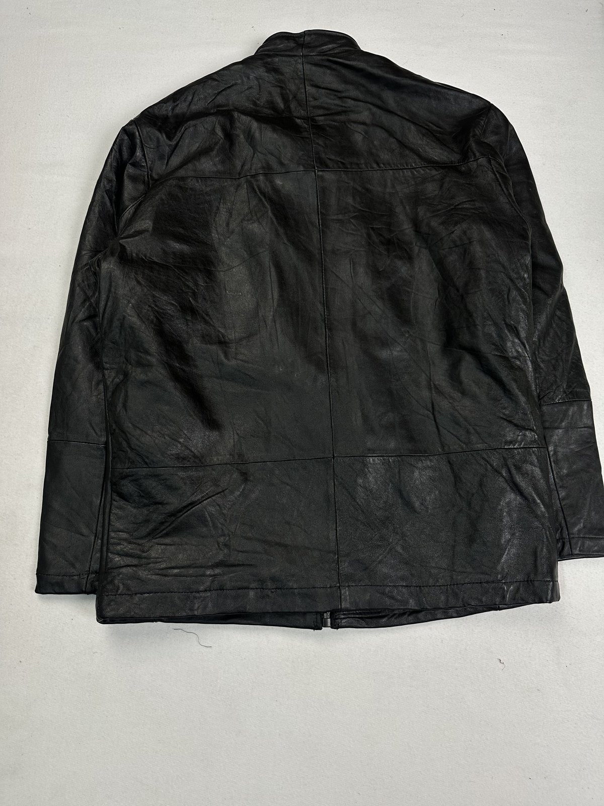 Fireman clasp closing the front of the black leather jacket