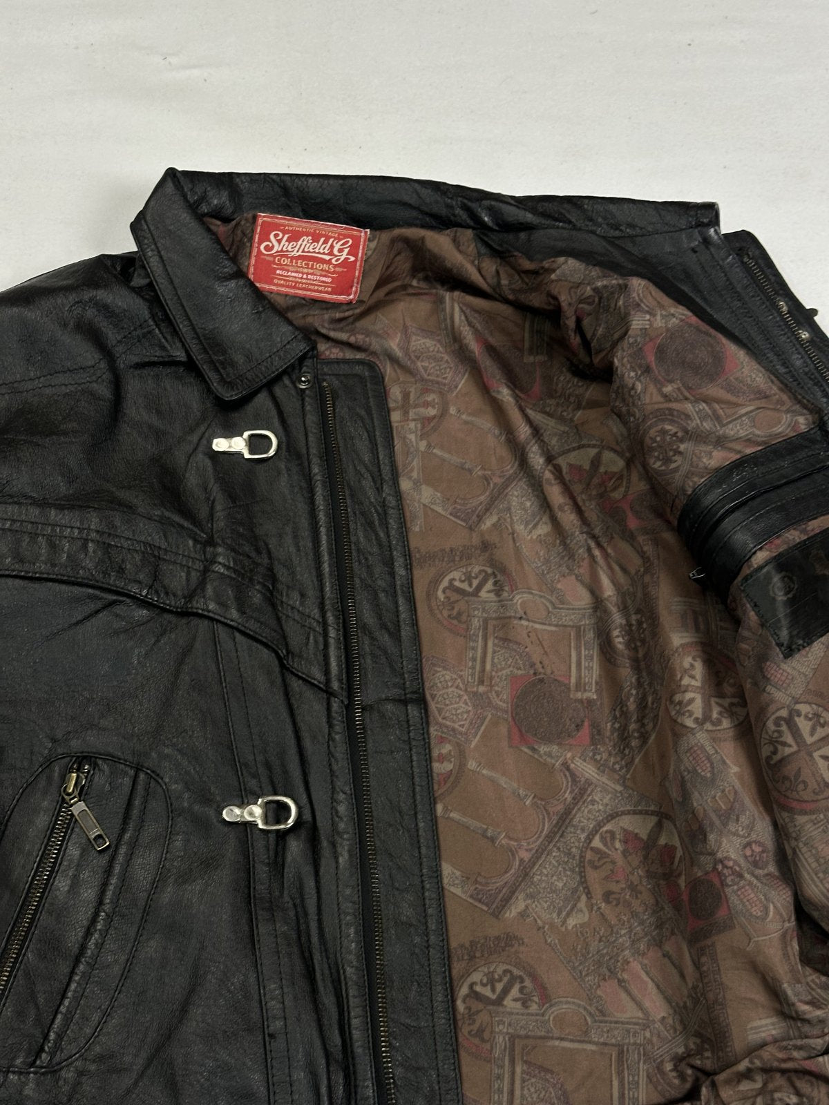 Black real leather jacket with a 24 inch sleeve, size XL