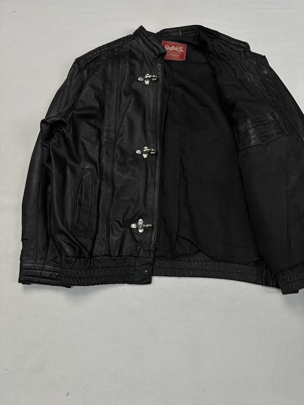Black real leather blouson with a 24 inch sleeve, size XXL