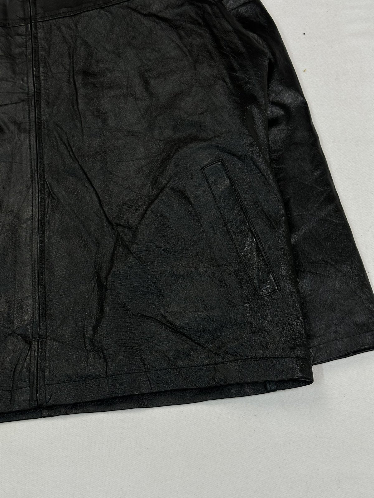 Black cafe racer jacket in very good condition, shown in size XL