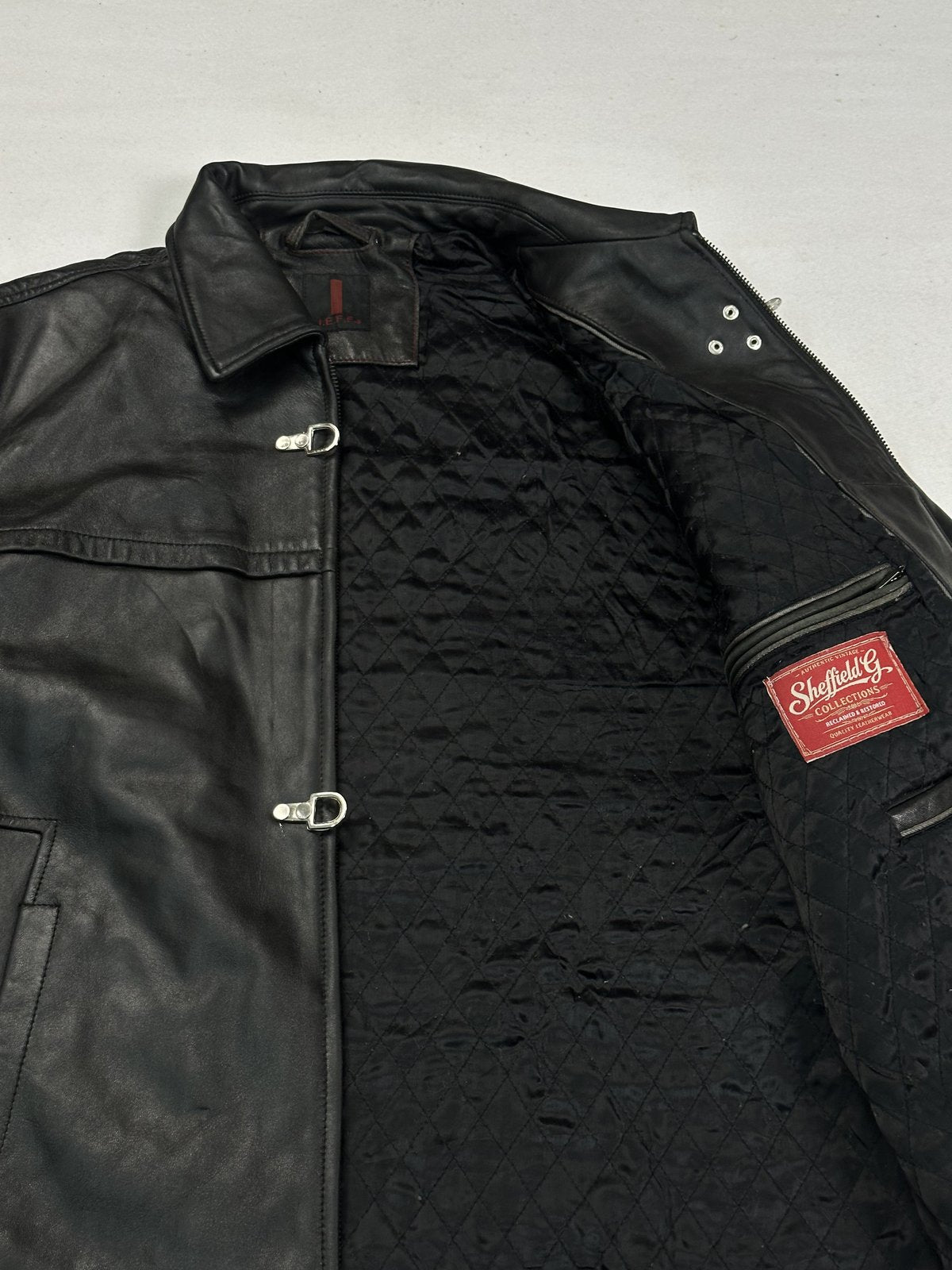 Black real leather jacket with a 25 inch sleeve, size XL