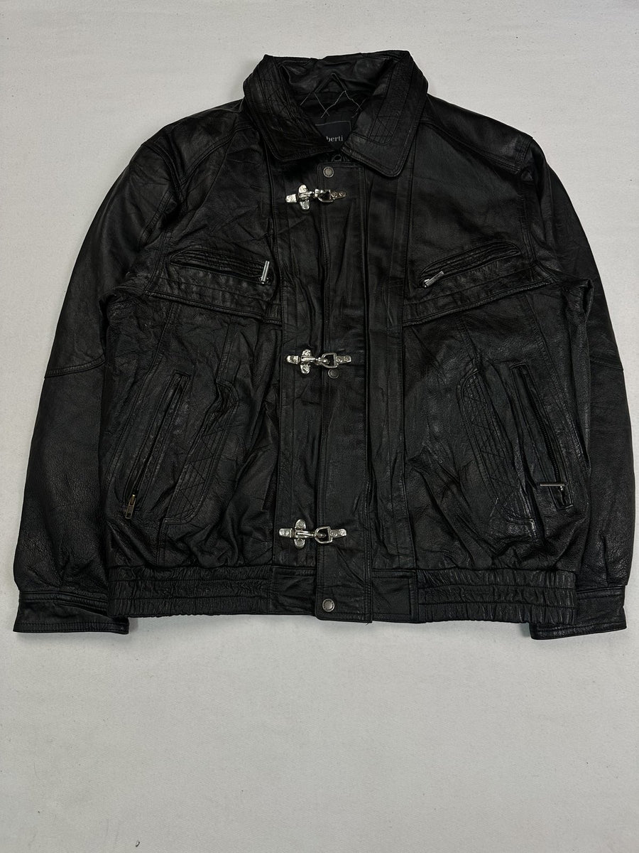 Black leather vintage jacket in size XXL shown from the front with quilted zip pockets